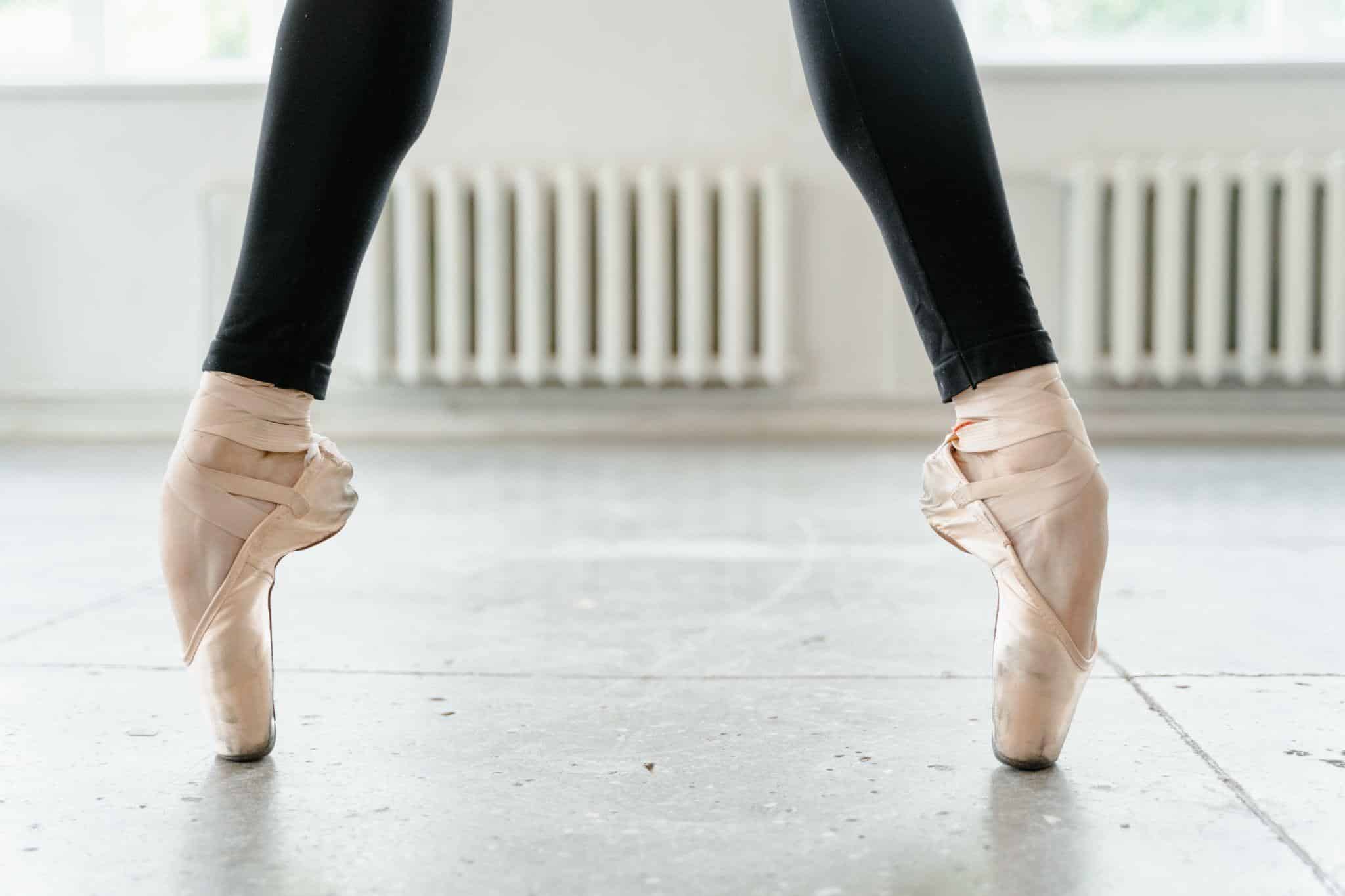 A female dancer on pointe with only legs showing