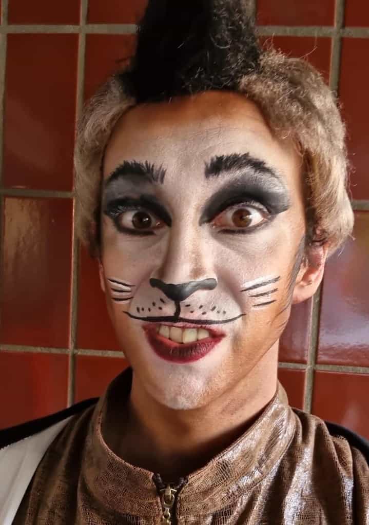 Male dancer wearing ballet stage makeup for Cats performance