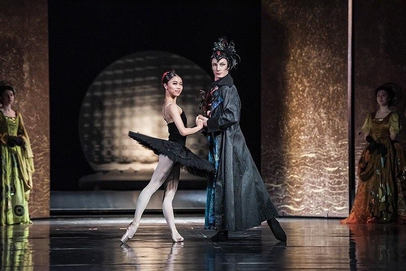 Odile and Rothbart on stage during swan lake ballet