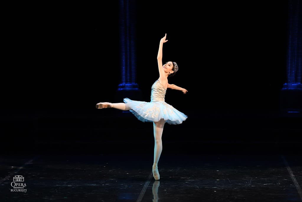 Professional ballerina dancing Raymonda on stage