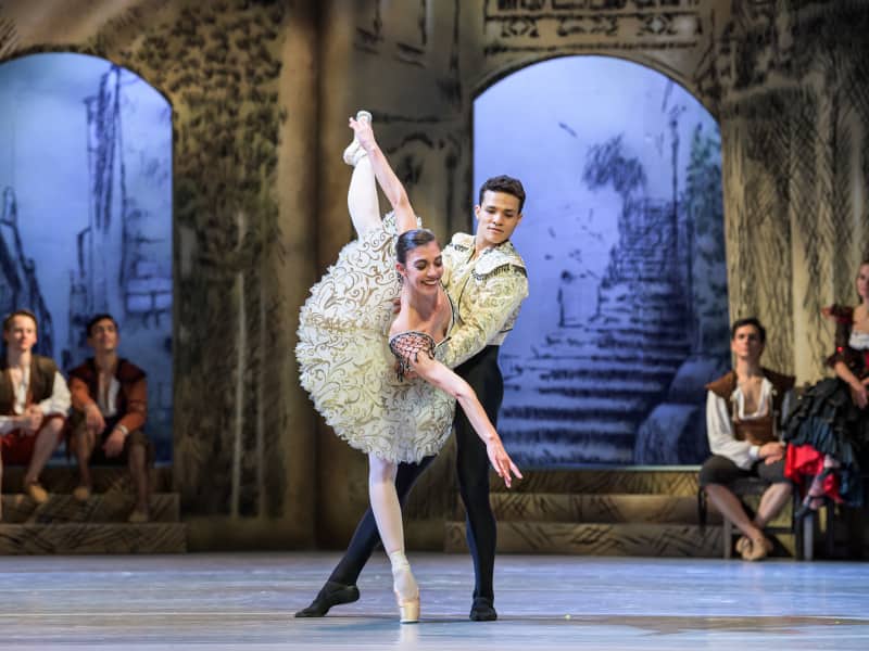 Two dancers dancing Don Quixote Ballet on stage