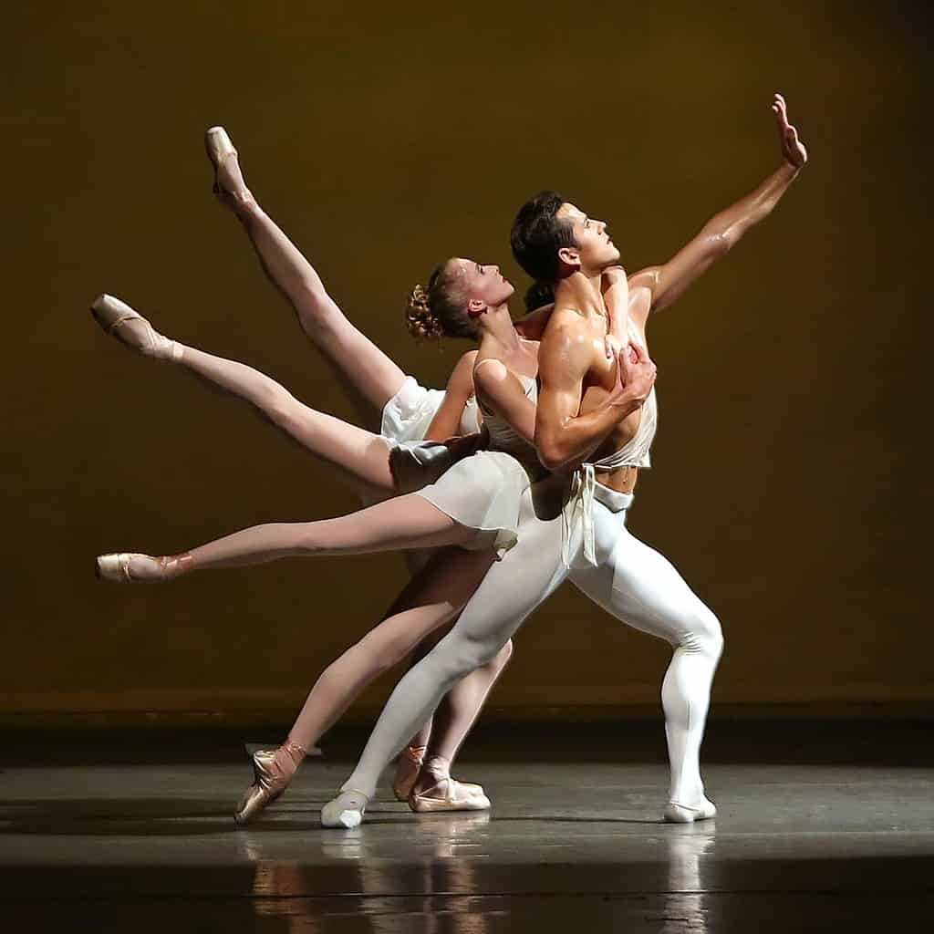 Dancers on stage dancing the neoclassical ballet Apollo