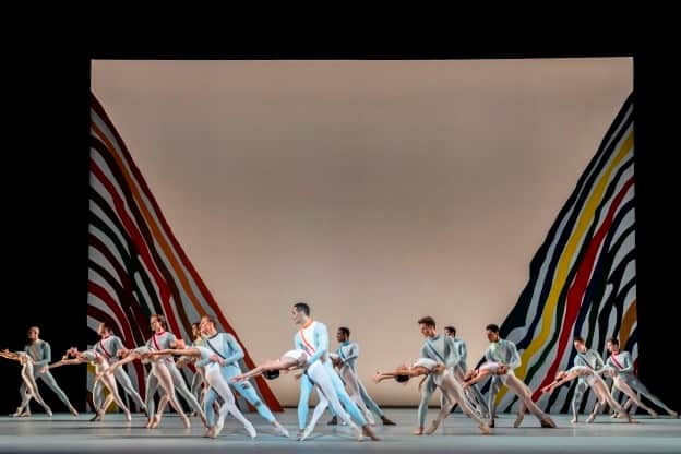 Dancers on stage dancing the neoclassical ballet Seventh Symphony 