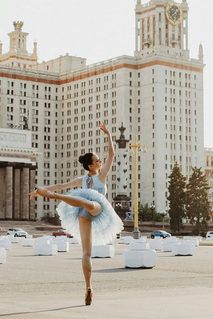 Ballerina performing a ballet attitude in the street