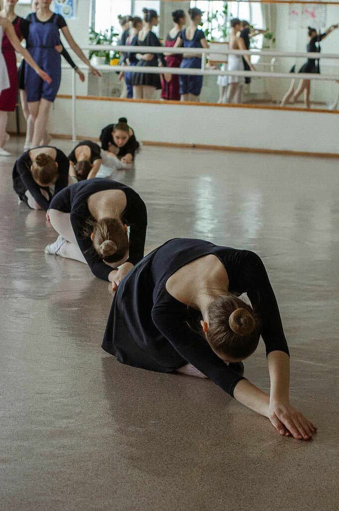 Dancers participating in a private ballet workshop