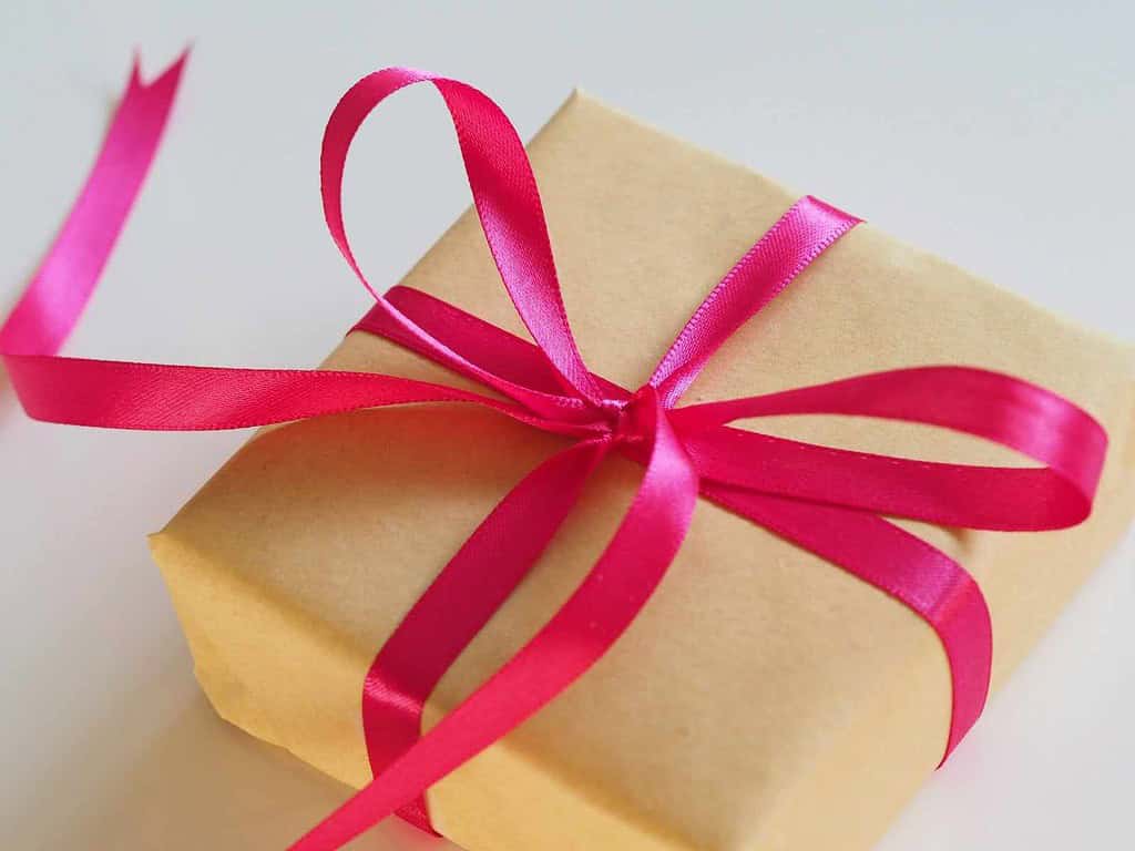 Ballet gift wrapped in paper with a pink ribbon