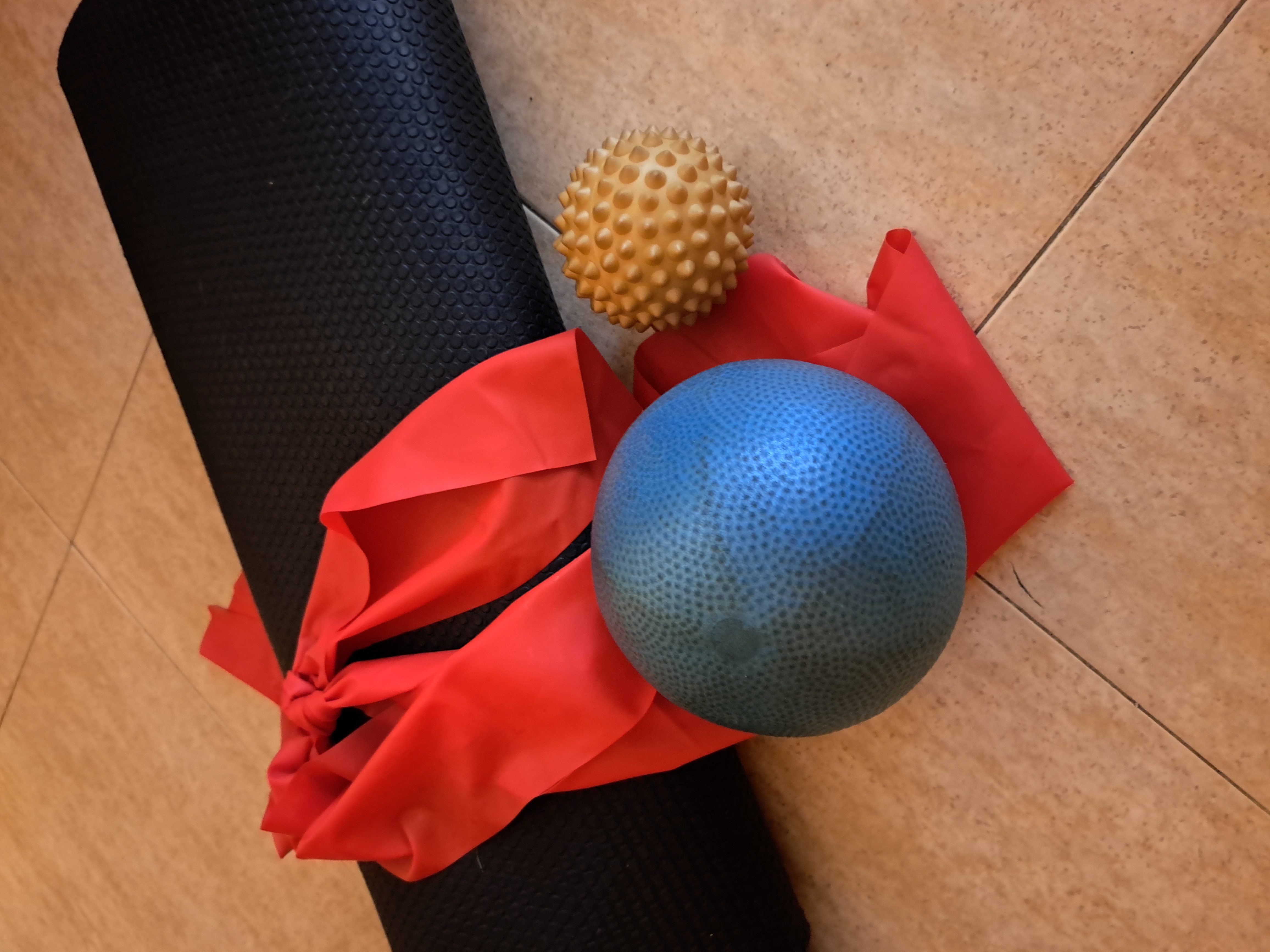 Thera band, overball, Pilates mat and massage ball