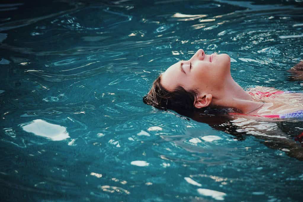 Dancer relaxing in a pool