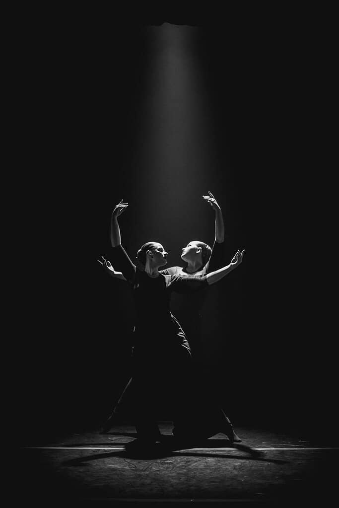 Two female dancers performing on stage