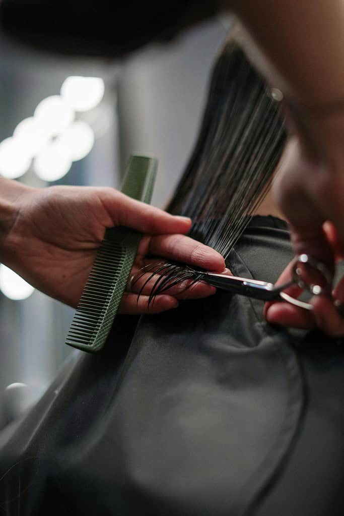 Female getting her hair cut