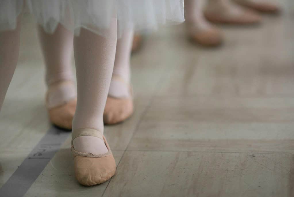 Young dancers wearing ballet flats