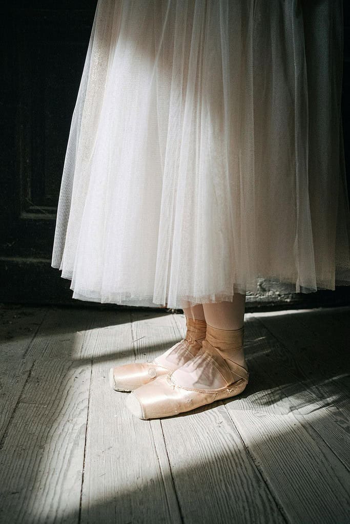 Female dancer standing with feet in parallel