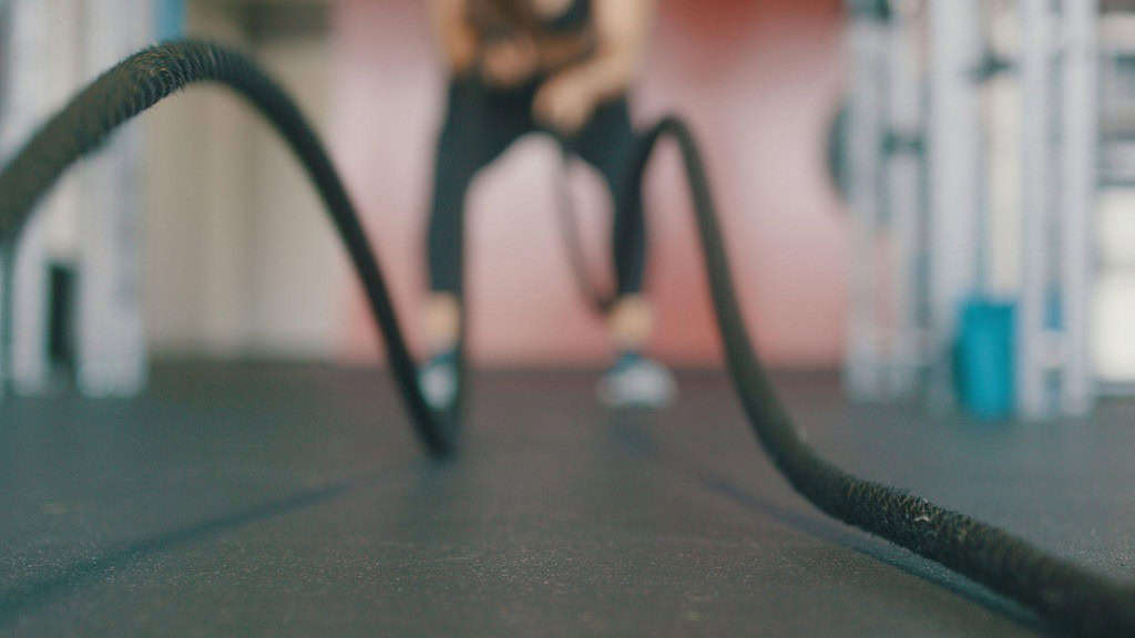 Lady doing rope exercise for cross-training